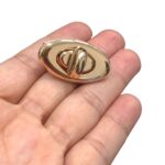 Fecho P/ Bolsa Oval 3.5×2cm Dourado – 1 Und - Imagem 2