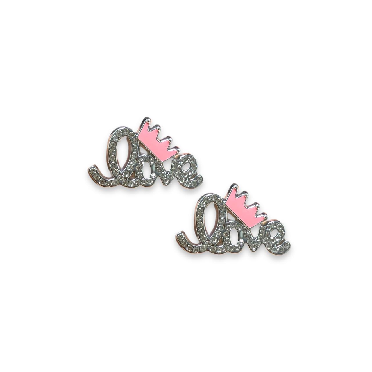 WhatsApp Image 2025-10-27 at 10.38.26 (26) Aplique P/ Crocs 22x45mm Abs Níquel – 1 Und - Imagem 1