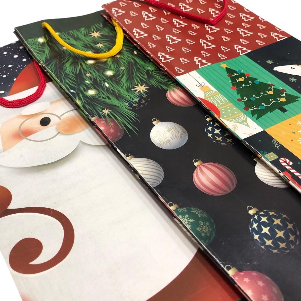 WhatsApp Image 2025-11-07 at 10.19.57 (9) Sacola Papel Natalino 12x36cm - 1 Und - Imagem 1