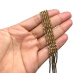 Fio Hematita 2mm Dourado - 1 Fio - Imagem 2